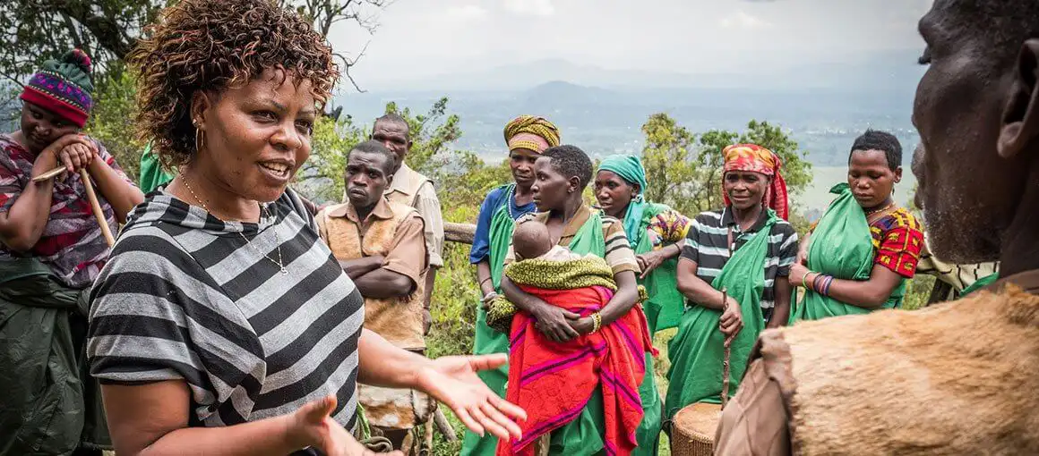 Salvatrice Musabyeyezu, International Gorilla Conservation Program (IGCP) Tourism Specialist talking with the Batwa about their tourism program.