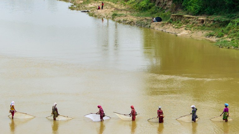 Women fishing in Nepal, credit Olaf Zerbock